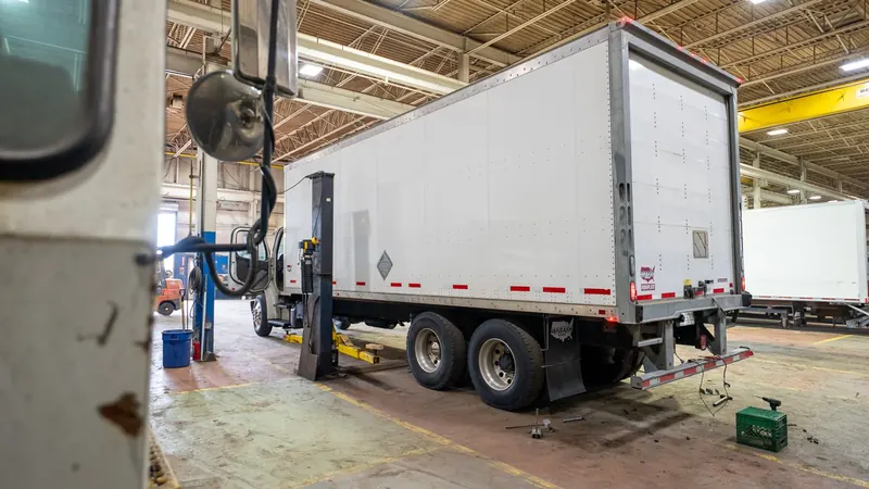 Tandem-axle box truck in the shop