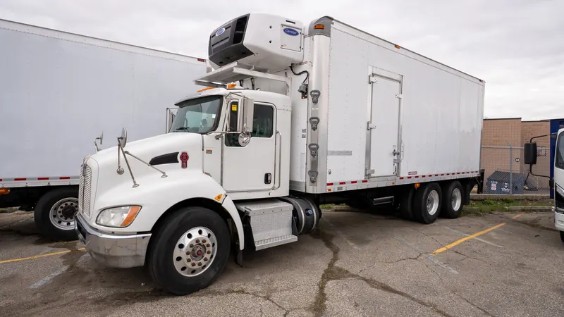 Refrigerated straight truck in the yard