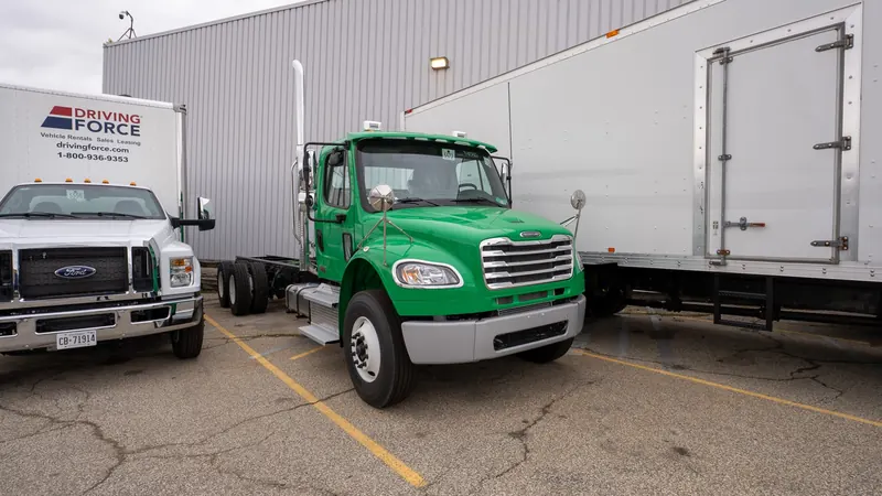 Green box truck in the yard