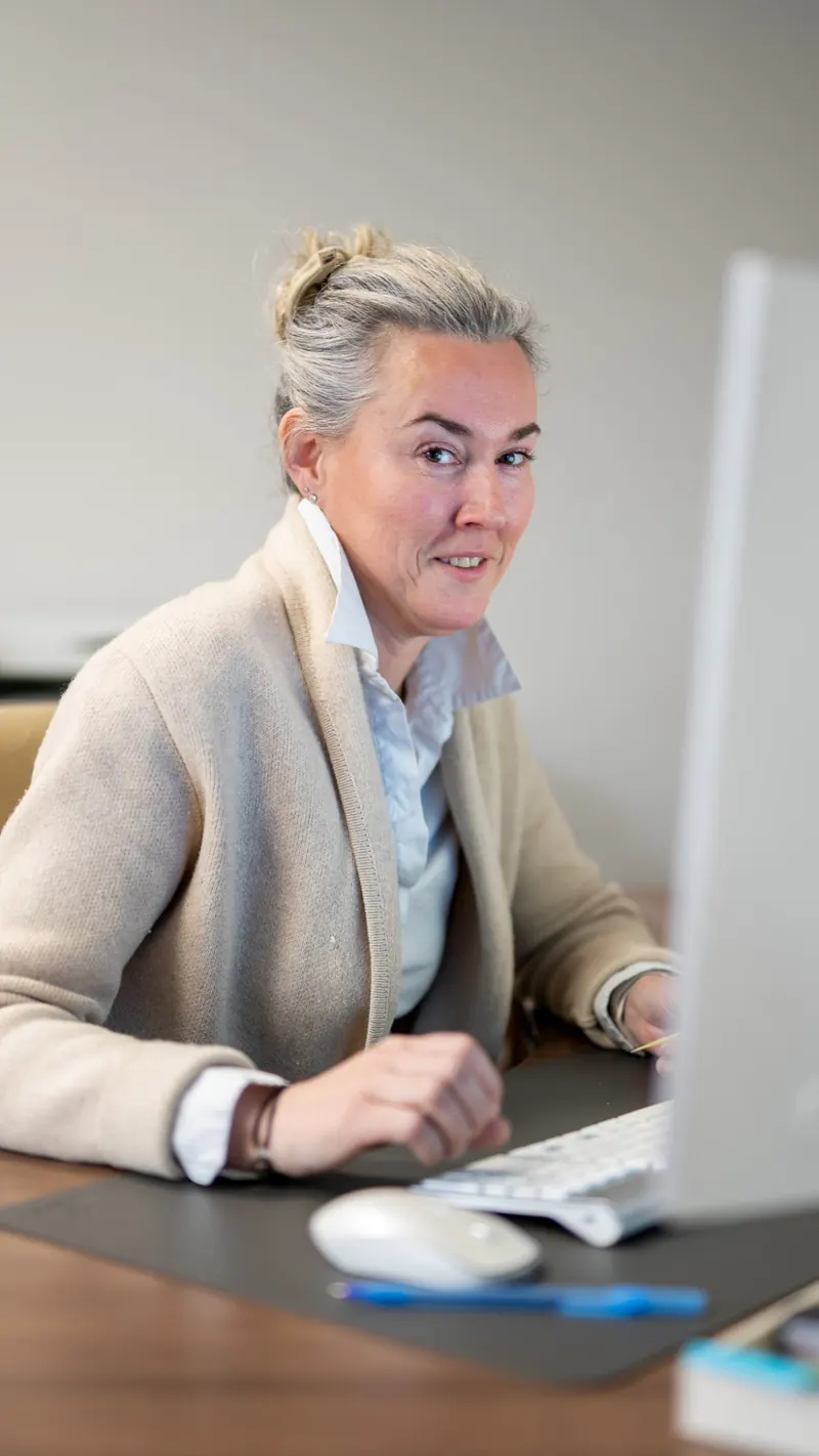Team member at her desk