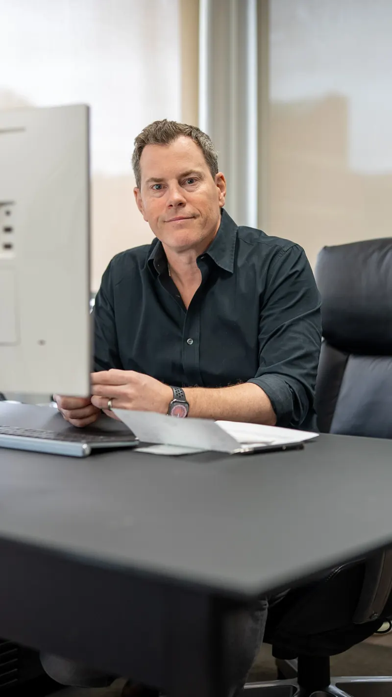 Team member at his desk