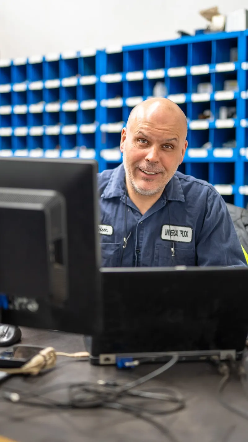 Parts counter staff at work